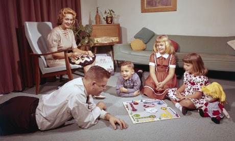 Old school family plays a board game
